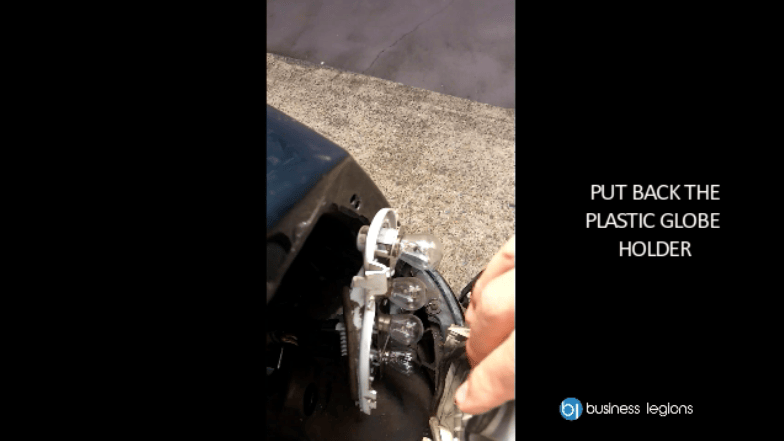 How to change holden astra sedan 2000 tail light - put back the plastic globe holder