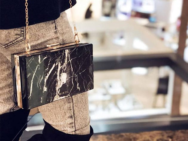 Mish Nero Marquina Marble Clutch for $440